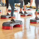 Exercising on Life fitness Studio Step and Riser